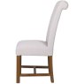 Scroll Back Dining Chair In Natural side on image of the chair on a white background