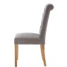 Button Back Scroll Top Dining Chair In Grey side on image of the chair on a white background