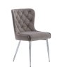Button Back Grey Velvet Dining Chair angled image of the chair on a white background