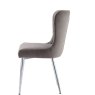 Button Back Grey Velvet Dining Chair side on image of the chair on a white background