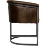 Leather & Iron Classic Tub Chair In Brown side on image of the chair on a white background