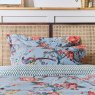 Joules Blue Chinoise Floral Duvet Cover Set lifestyle image of the duvet cover set