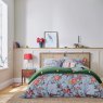 Joules Blue Chinoise Floral Duvet Cover Set lifestyle image of the duvet cover set
