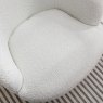 Alma Ivory Swivel Chair close up lifestyle image of the chair