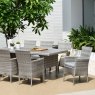 Aruba Stacking Chair lifestyle image of the chair with other chairs and a table