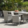 Aruba Stacking Chair lifestyle image of the chair with other chairs and a table
