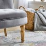 Monty Silver Accent Chair close up lifestyle image of the chair