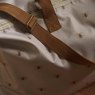Sophie Allport Bees Oakham Weekend Bag lifestyle strap close up