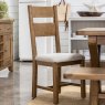 Manor Oak 2m Extending Crossed Leg Dining Table With 6 Ladder Back Chairs lifestyle image