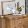 Manor Oak 5 Drawer Tall Chest close up lifestyle image