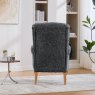Nova Fireside Chair In Stormcloud lifestyle image