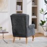 Nova Fireside Chair In Stormcloud lifestyle image
