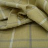 Close up of the rippled Mull fabric in Mustard