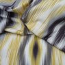 Close up of the rippled Nepal fabric in Ochre