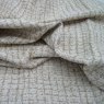 Close up of the rippled Tulsa fabric in Biscuit
