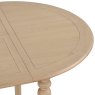 Broadway Round Extending Dining Table In Oak white background close up