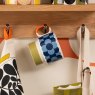 Orla Kiely Retro Stripe Mug Green Lifestyle