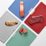 Joseph Joseph Folio Icon 4 Piece Large Board Set Silver/Coast with ingredients on boards